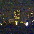 写真: 大池緑地公園から見た、夜の名駅ビル群 - 9（ミッドランドの壁面で「メッセナゴヤ」を宣伝）