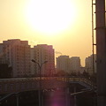 写真: 江月路站からの夕日と煙