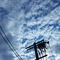 写真: 雲と電信柱
