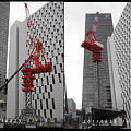 写真: 新中経ビル新築現場のクレーン台の上昇シーン