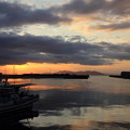 写真: 丸島漁港からの夕日