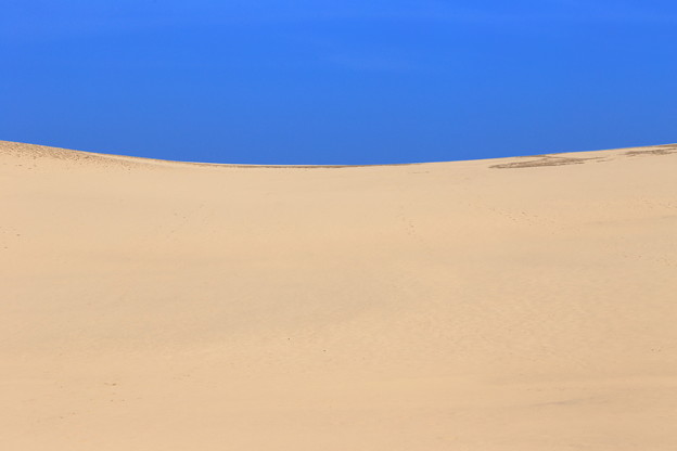 写真: 砂と空と