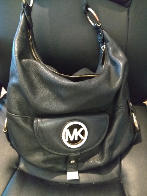 3.Michael kors black leather shoulder bag $70
