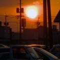 写真: 駐車場の日没