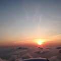 写真: 沖縄上空のサンセット