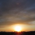 桜島の噴煙と夕日