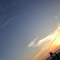 写真: 夕日と白良浜と旅立つジェット